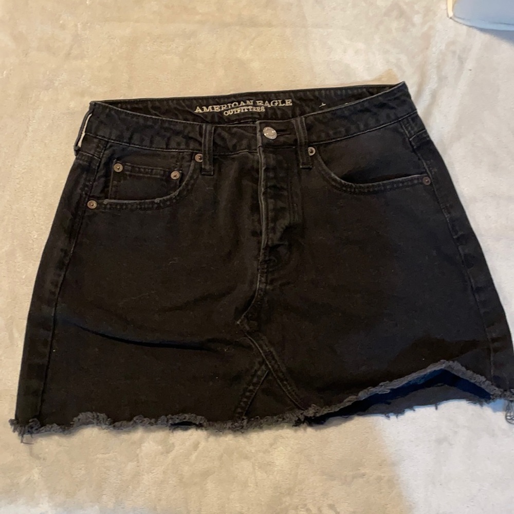 Black denim mini skirt